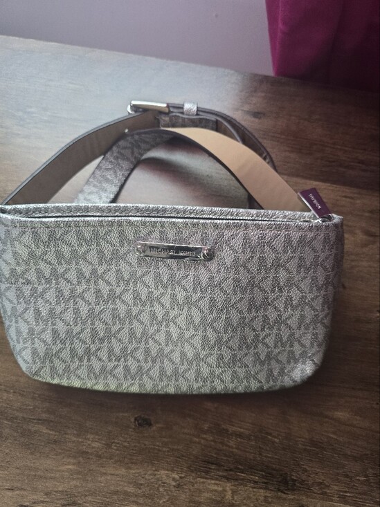 Michael Kors Handbags - Michael Kors Silver Monogram Wristlet Clutch